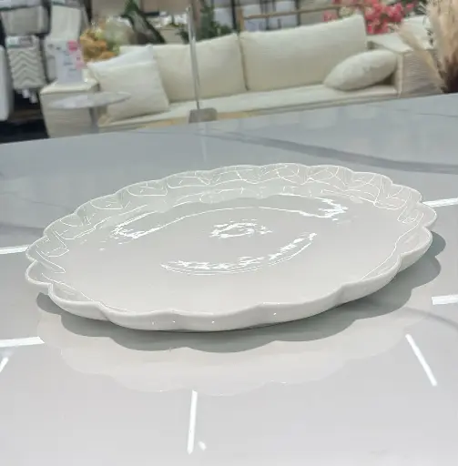 Plat rond beige feston