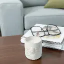 Bougie dans un pot en porcelai